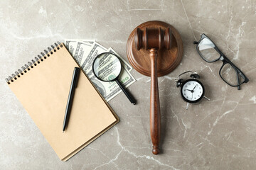 Law concept with judge gavel on gray textured table