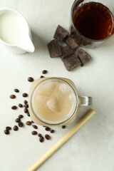 Concept of delicious drink with Irish coffee on white textured table