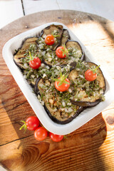 Grilled aubergines flavored with rosemary, olive oil and garlic