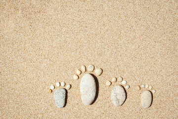 Fototapeta na wymiar Beautiful footprints in the sand sea nature background
