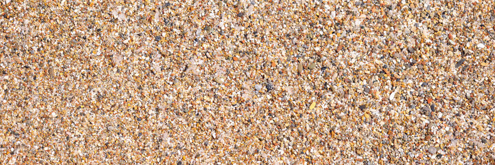 Texture of stones and sand on beach area