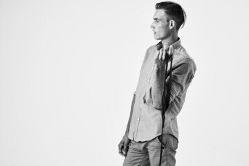 handsome man in shirt with tie emotions studio lifestyle