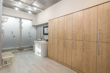 Modern shower room interior with wardrobes