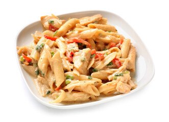 Plate with tasty cajun chicken pasta on white background