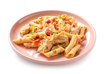 Plate with tasty cajun chicken pasta on white background