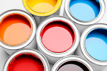 Paint cans on white background, closeup