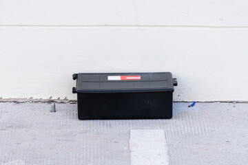 Poison rat trap box on the floor. Outdoor poison rat station in factory.