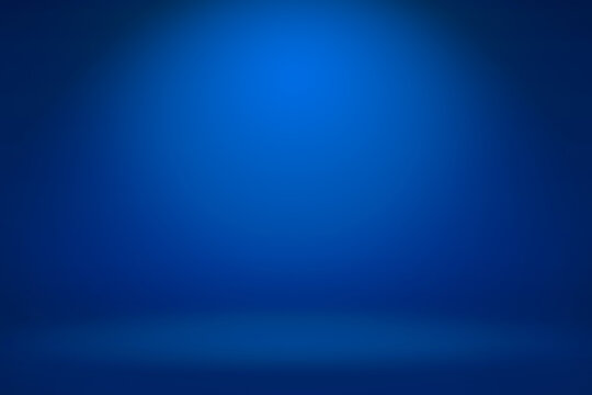 Empty dark blue studio room with light and shadow abstract background. Copy space studio room for present your products.