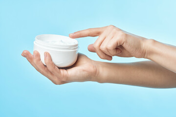 female hand cream jar cosmetics spa treatments dermatology