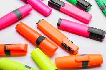 Colorful markers on white background