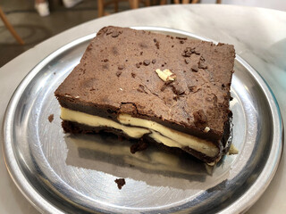 Brownie with White Chocolate Macro Close Up View. Ready to Eat.