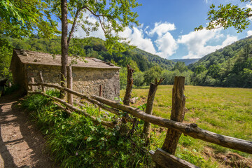 Fototapeta na wymiar Isolated country house on the Ramaceto Mount trail in Liguria, Genoa province, Italy