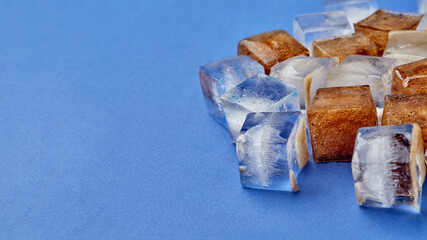 Close-up of ice cubes and cola with a place to copy the text.