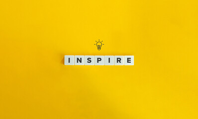 Inspire Banner and concept. Block letters on bright orange background. Minimal aesthetics.