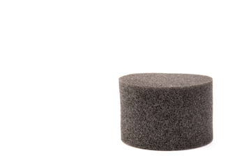 piece of foam rubber on white background. Black sponge