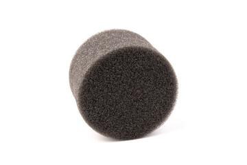 piece of foam rubber on white background. Black sponge