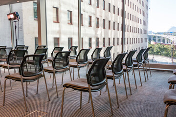 Stockholm, Sweden  Empty chairs in a conference room and windows.