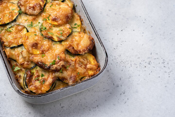 casserole with zucchini squash and cheese in baking dish