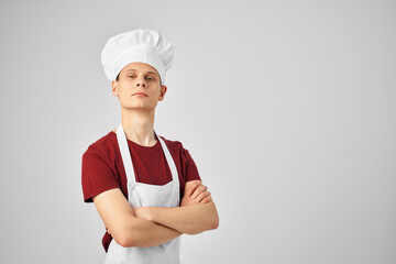 male chef wearing white apron professional work
