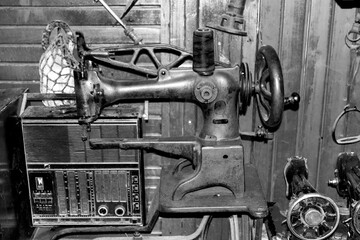 old sewing machine with thread