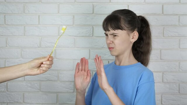 Give up plastic. A child refuse to take a plastic teethbrush and take a bamboo one in the room.