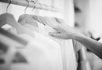 Woman checking out clothes