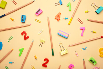 School supplies on beige background. Back to school concept.
