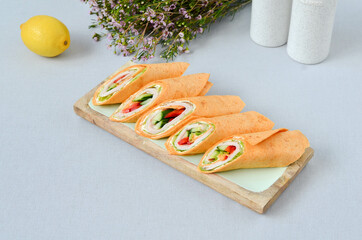A set of beautiful canapes on a table with a gray tablecloth. Buffet table. Catering