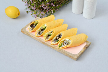 A set of beautiful canapes on a table with a gray tablecloth. Buffet table. Catering