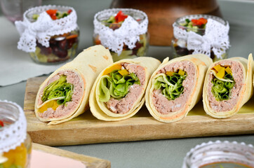 A set of beautiful canapes on a table with a gray tablecloth. Buffet table. Catering