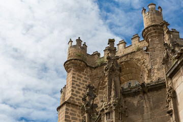 Detailed view at the lateral ornaments tower, gothic monument building Primate Cathedral of Saint Mary of Toledo