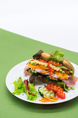 Banh mi vietnamese sandwiches with various stuffing, in craft brown paper. Creative still life of traditional breakfast, copy space.
