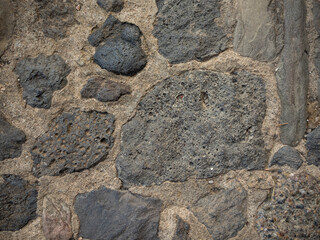 stone wall detail texture with cement in the joints