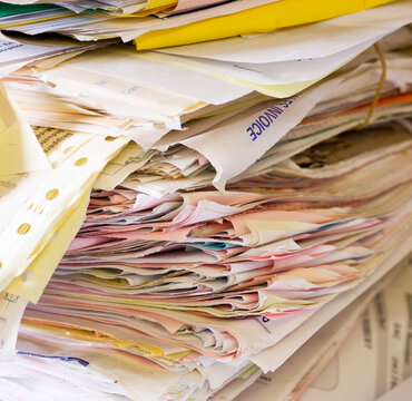 stack of invoices in an office
