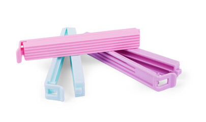 Colorful clothespins hanging on the clothesline. Isolated on white