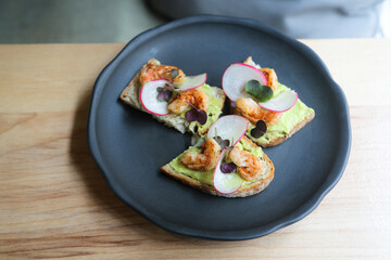 Bruschetta with shrimps and avocado