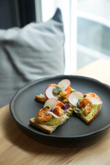 Bruschetta with shrimps and avocado