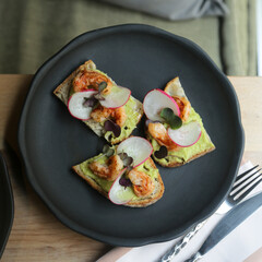 Bruschetta with shrimps and avocado
