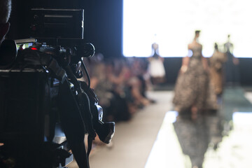 Television Camera Broadcasting a Show, Fashion Show, Catwalk event, Fashion Week themed photo.