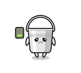 metal bucket mascot character doing a tired gesture