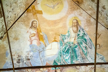 drawings on the walls of an abandoned Orthodox church