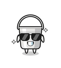 Fototapeta premium Cartoon mascot of metal bucket with cool gesture