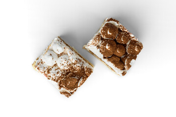 Slice of tiramisu cake isolated on white background.