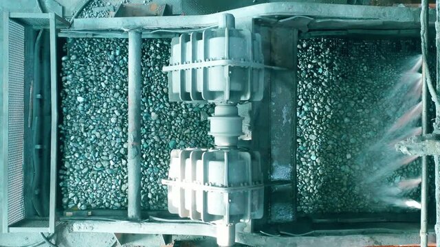 Copper ore is moving through the grinding machine in a top view