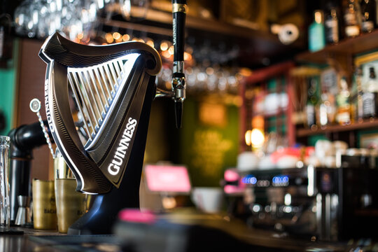 Guinness beer tap in a pub in Bucharest