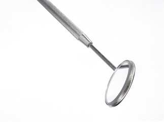 Dental instrument tool on white background.