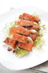 deep fried pork belly with garlic meat in white background asian halal menu