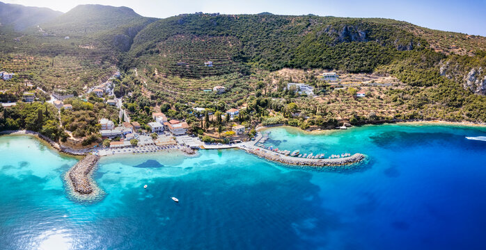 Aerial view of the little fishing village Kitries with a small marina and beach, Mani area, Peloponnese, Greece © moofushi