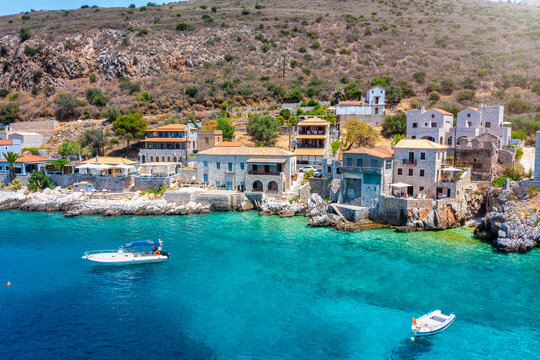 The idyllic fishing village Limeni on the south Mani coast, Peloponnese, Greece, with shining, turquoise sea during summer time