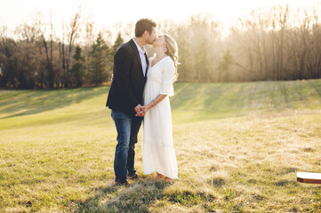 Scenic view of a happily married couple kissing each other